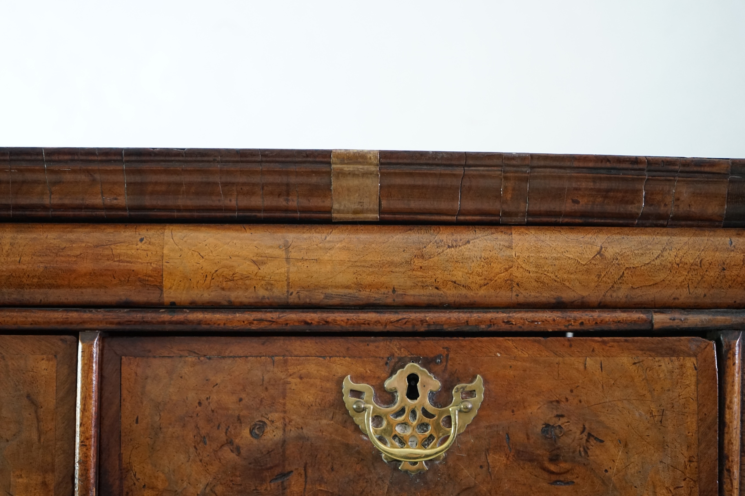 An early 18th century walnut chest on stand